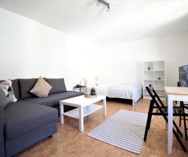 Excellent studio - best location, big rooftopterrace