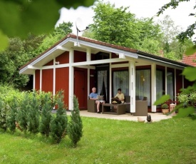 Single storey detached bungalow, in a wooded area